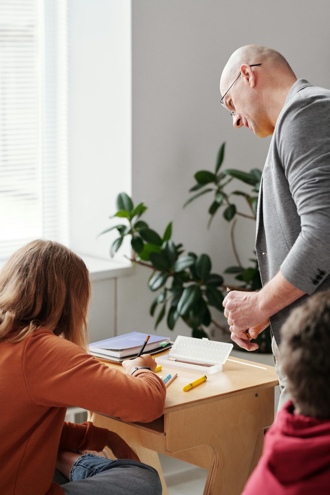 An educator supporting students